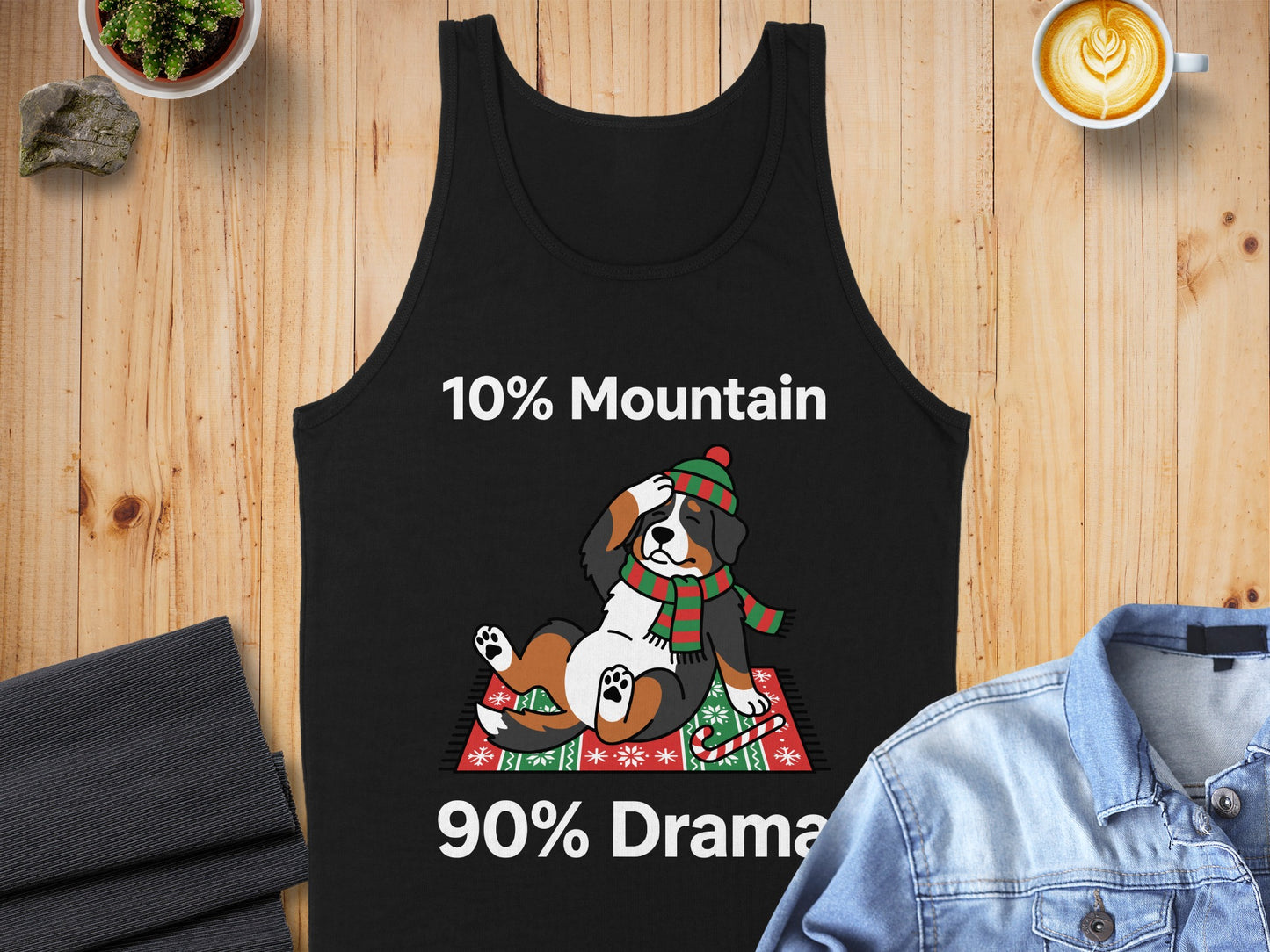 Black tank top with a Bernese Mountain Dog laying down and wearing a hat and scarf.