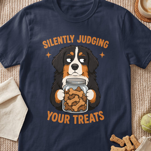 Bernese Mountain Dog holding jar of bone treats with text "SILENTLY JUDGING YOUR TREATS".
