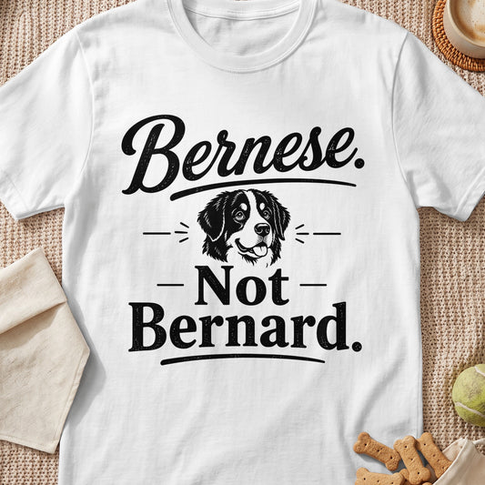 White t-shirt with "Bernese. Not Bernard." text and a dog illustration.