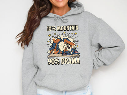 Gray hoodie with cartoon dog and text "10% MOUNTAIN 90% DRAMA".