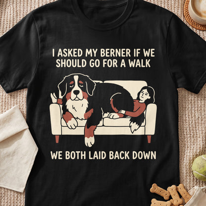 Black t-shirt with text and illustration of a Bernese Mountain Dog and person on a couch.