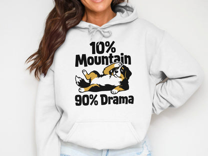 White hoodie with text "10% Mountain 90% Drama" and a cartoon dog.