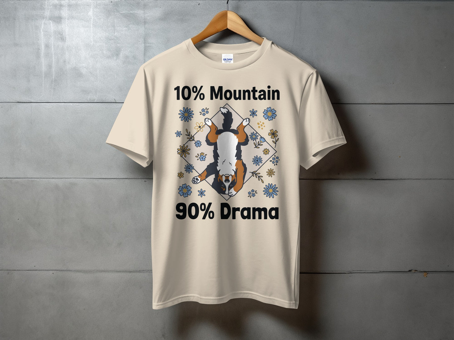 Cream t-shirt with "10% Mountain 90% Drama" and dog graphic.