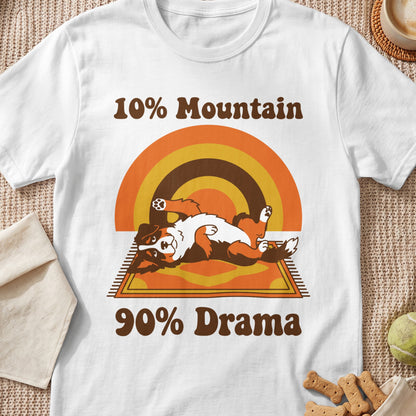 Bernese mountain dog lying on its back with text "10% Mountain 90% Drama."