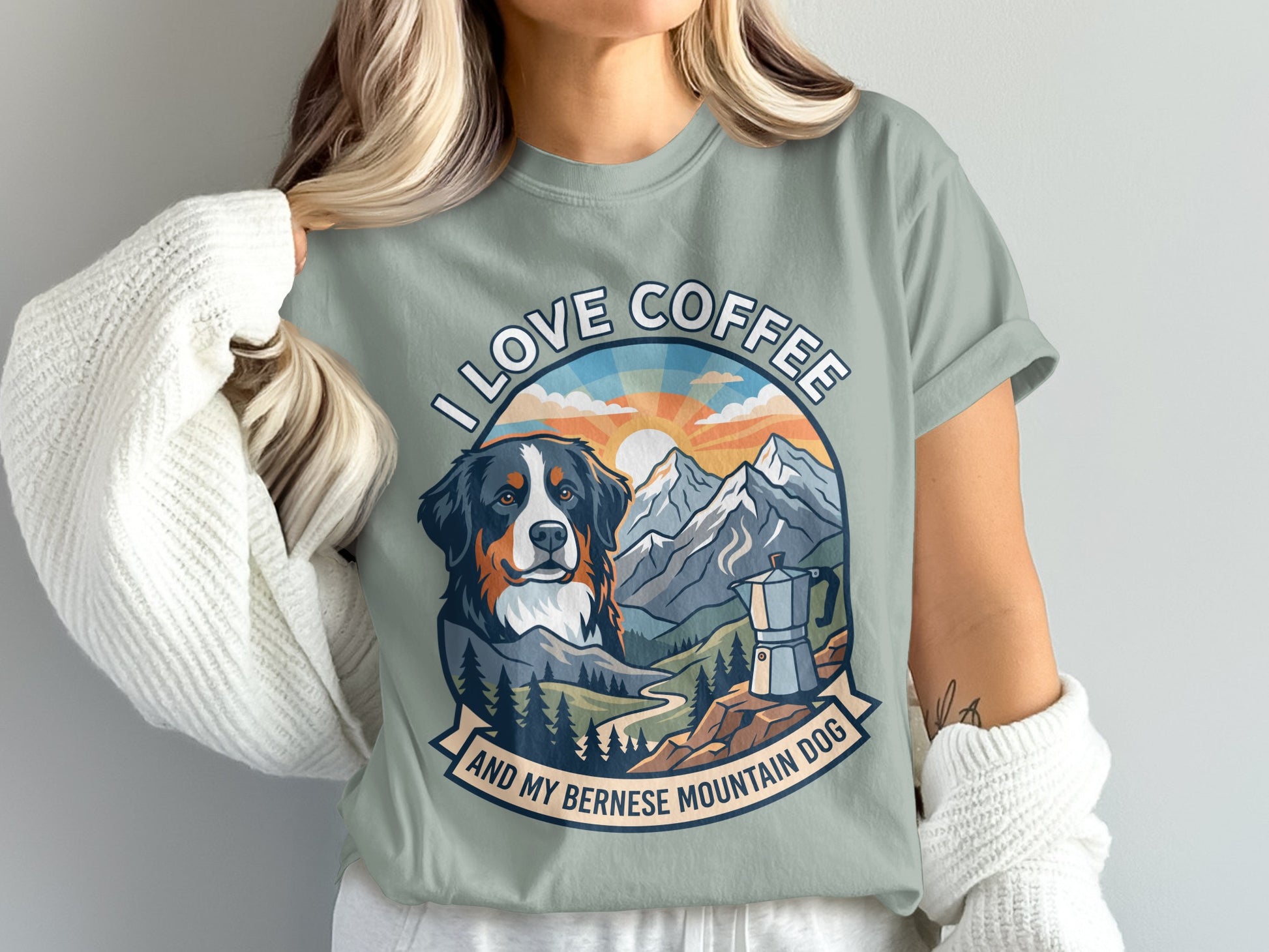 T-shirt graphic with Bernese Mountain Dog, mountains, coffee pot, and text "I LOVE COFFEE AND MY BERNESE MOUNTAIN DOG".