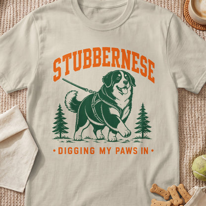 Stubbernesee dog graphic with text "Digging My Paws In" and pine trees.