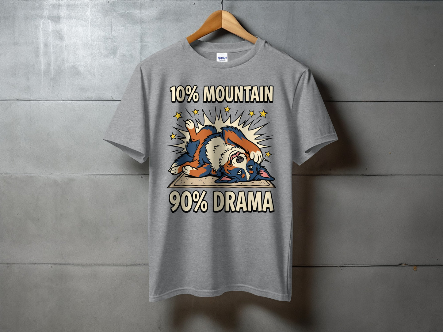 Grey t-shirt with cartoon dog and text "10% MOUNTAIN 90% DRAMA".