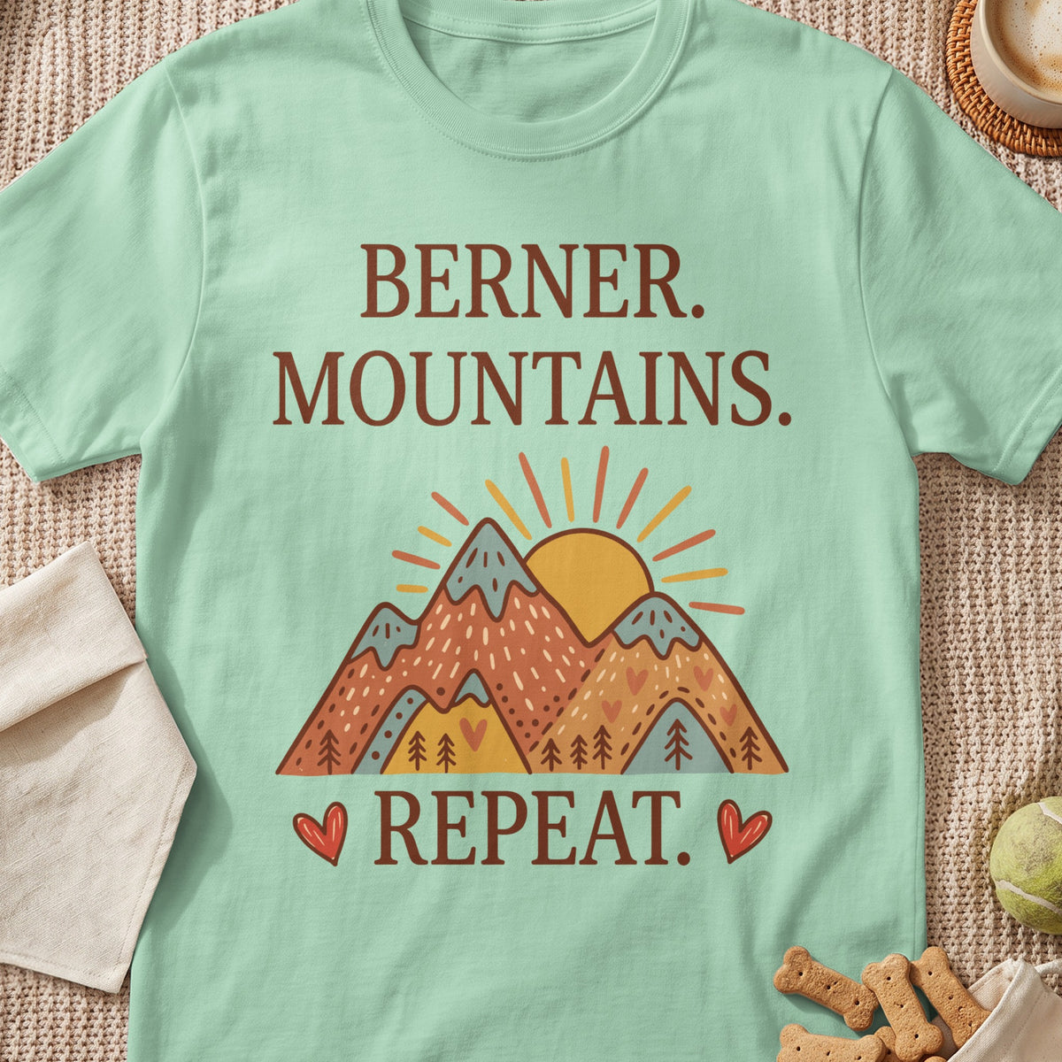 Light mint green t-shirt with "Berner. Mountains. Repeat." and a mountain graphic.