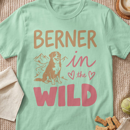 Berner in the Wild text with a dog graphic and mountains on a mint t-shirt.