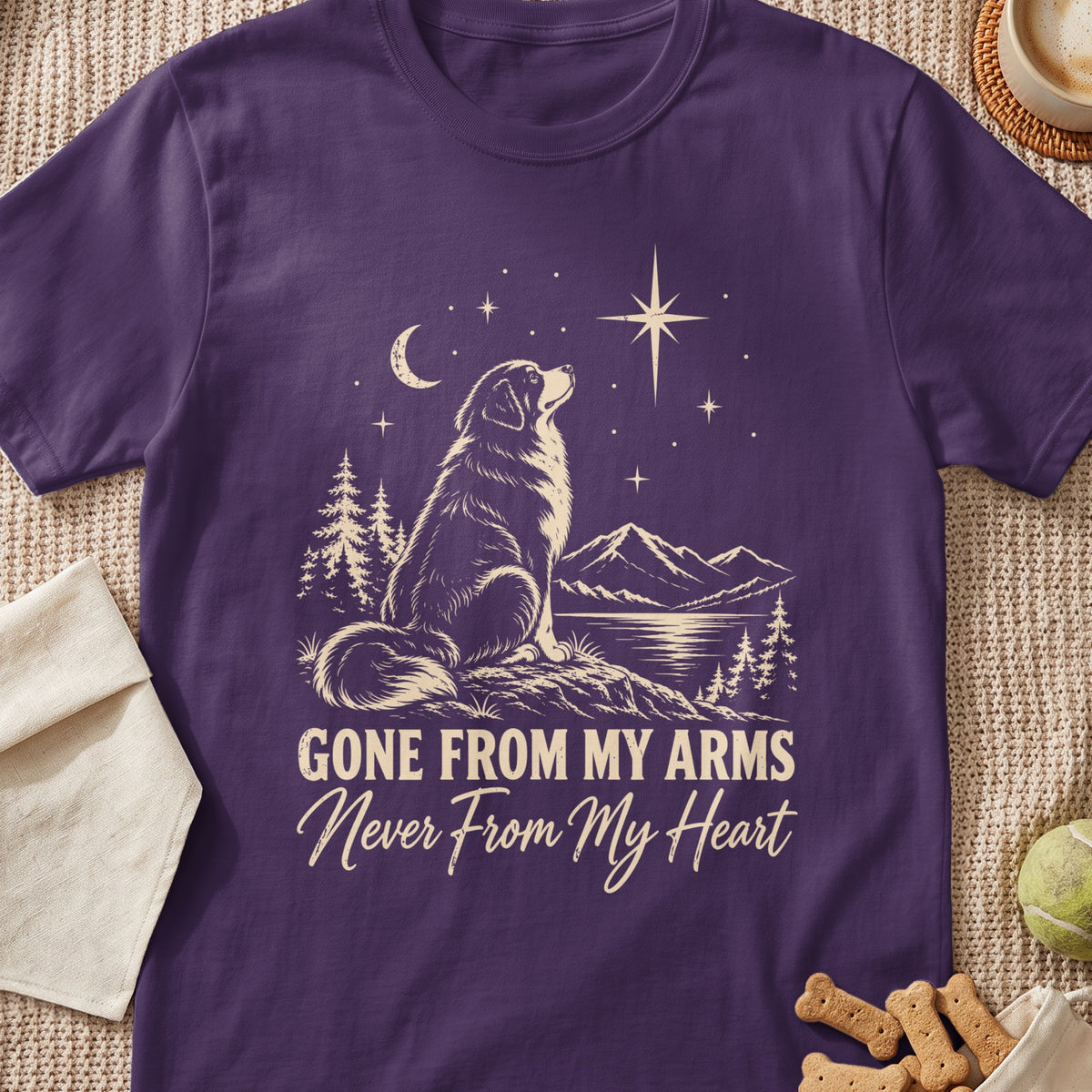 Purple t-shirt with a dog looking at a starry night sky and text.