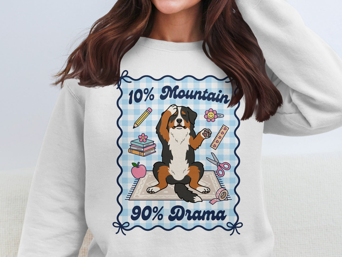 Bernese Mountain Dog with "10% Mountain 90% Drama" text, school supplies.