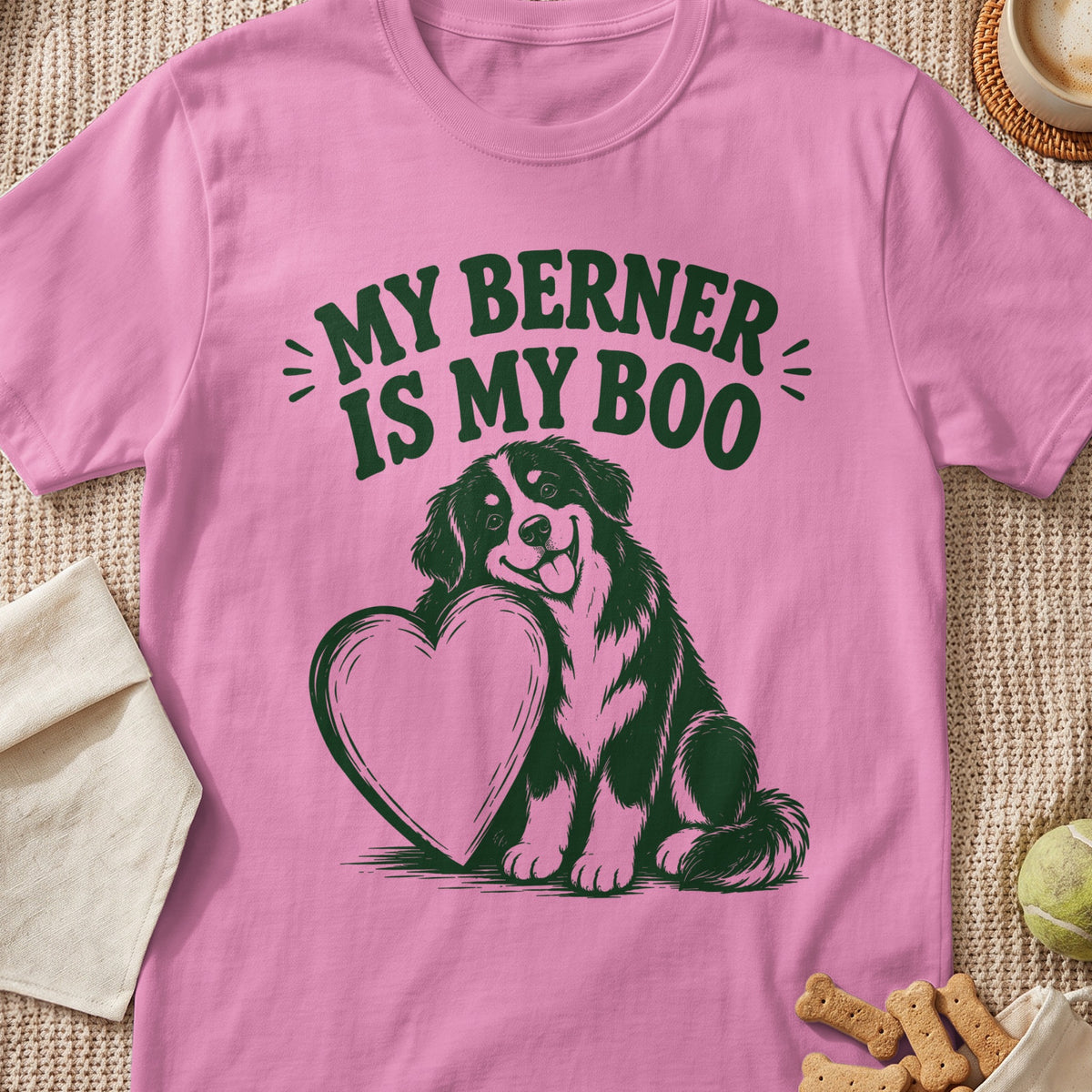 Pink t-shirt with dark green graphic of a Bernese Mountain Dog holding a heart, text reads "MY BERNER IS MY BOO".
