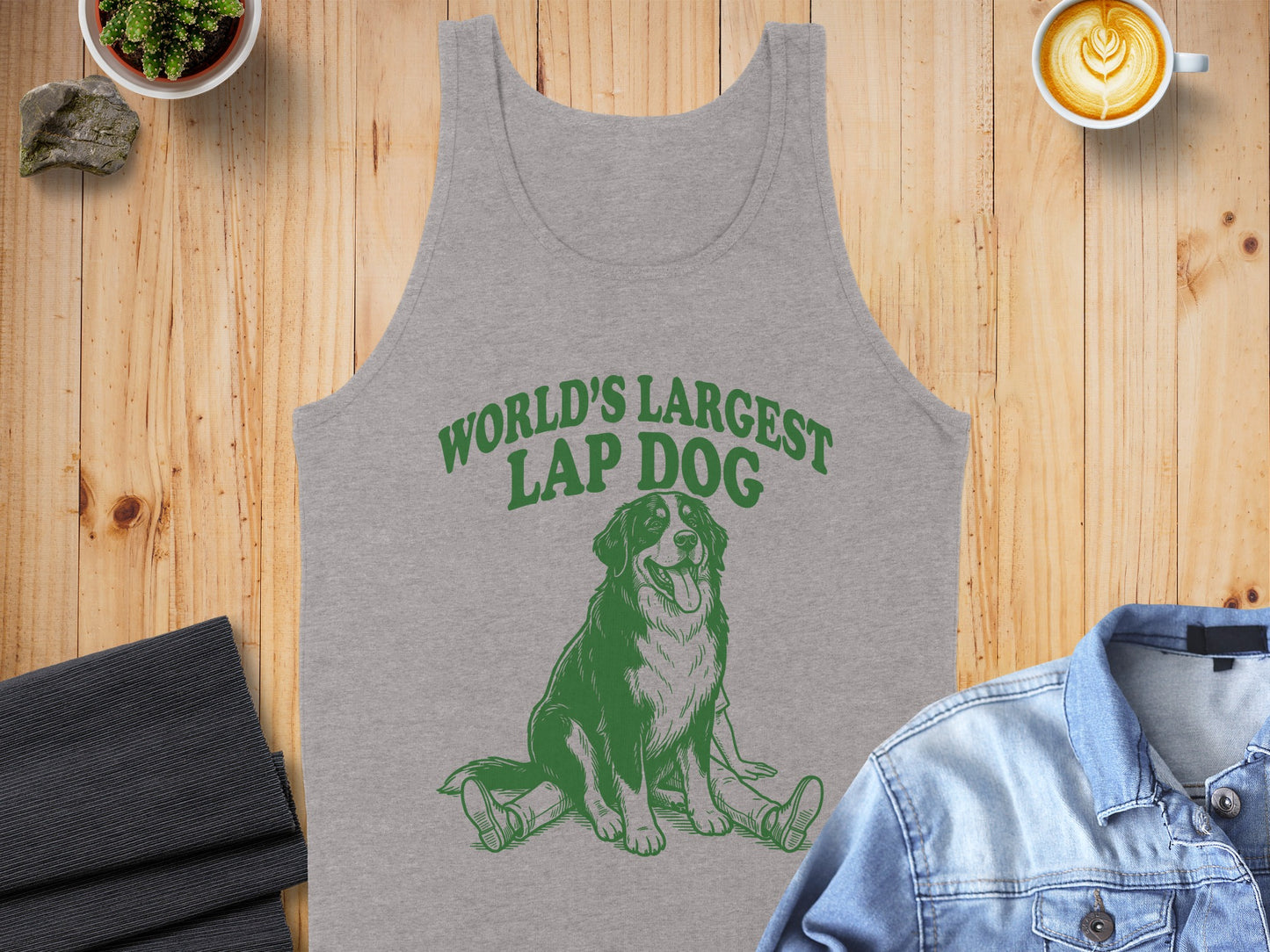 Grey tank top with green text "WORLD'S LARGEST LAP DOG" and a dog graphic.