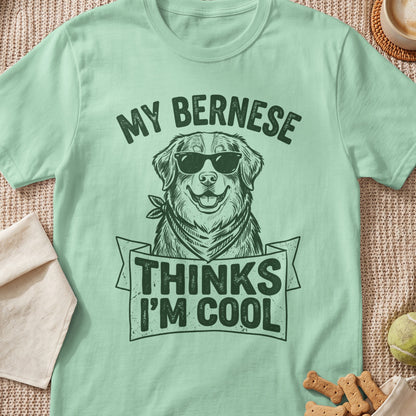Mint t-shirt with graphic of Bernese dog wearing sunglasses and bandana, text says "MY BERNESE THINKS I'M COOL".