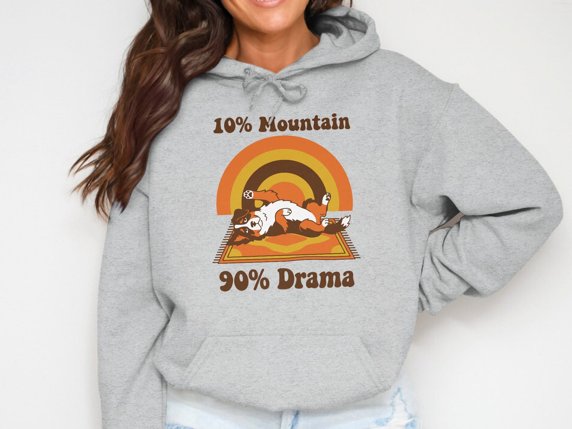 Grey hoodie with "10% Mountain 90% Drama" text and a dog graphic.