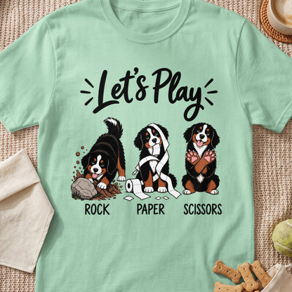 Three Bernese Mountain Dogs with "Let's Play Rock Paper Scissors" text.