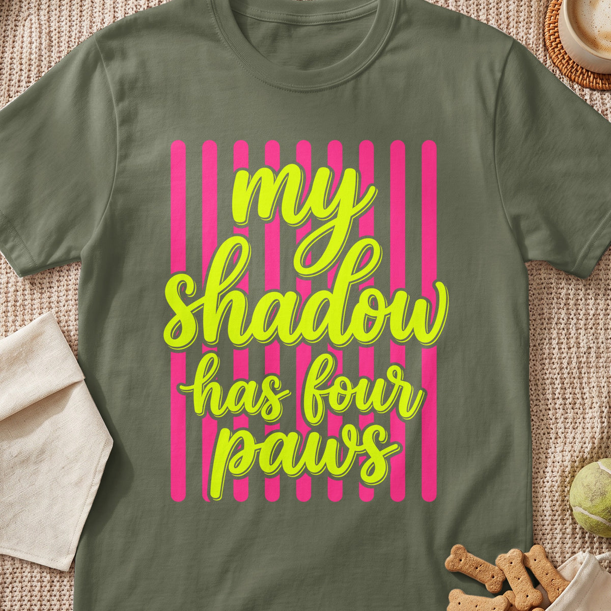 Olive green t-shirt with "my shadow has four paws" text.