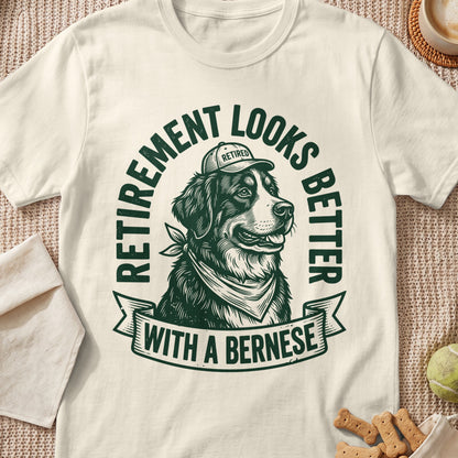 Bernese dog wearing a "Retired" hat and bandana, text "Retirement looks better with a Bernese."