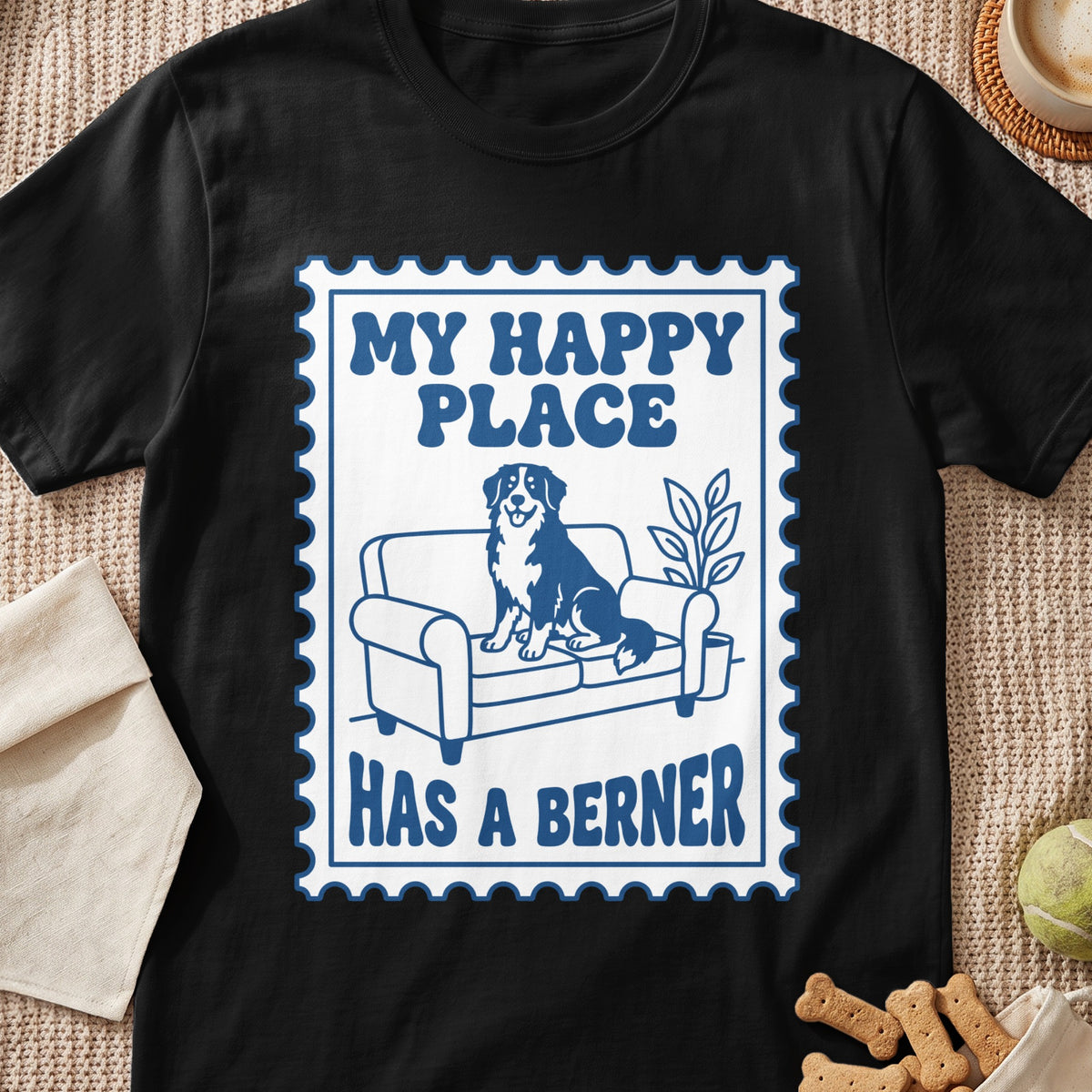 Black t-shirt with "My Happy Place Has a Berner" text and dog on couch graphic.