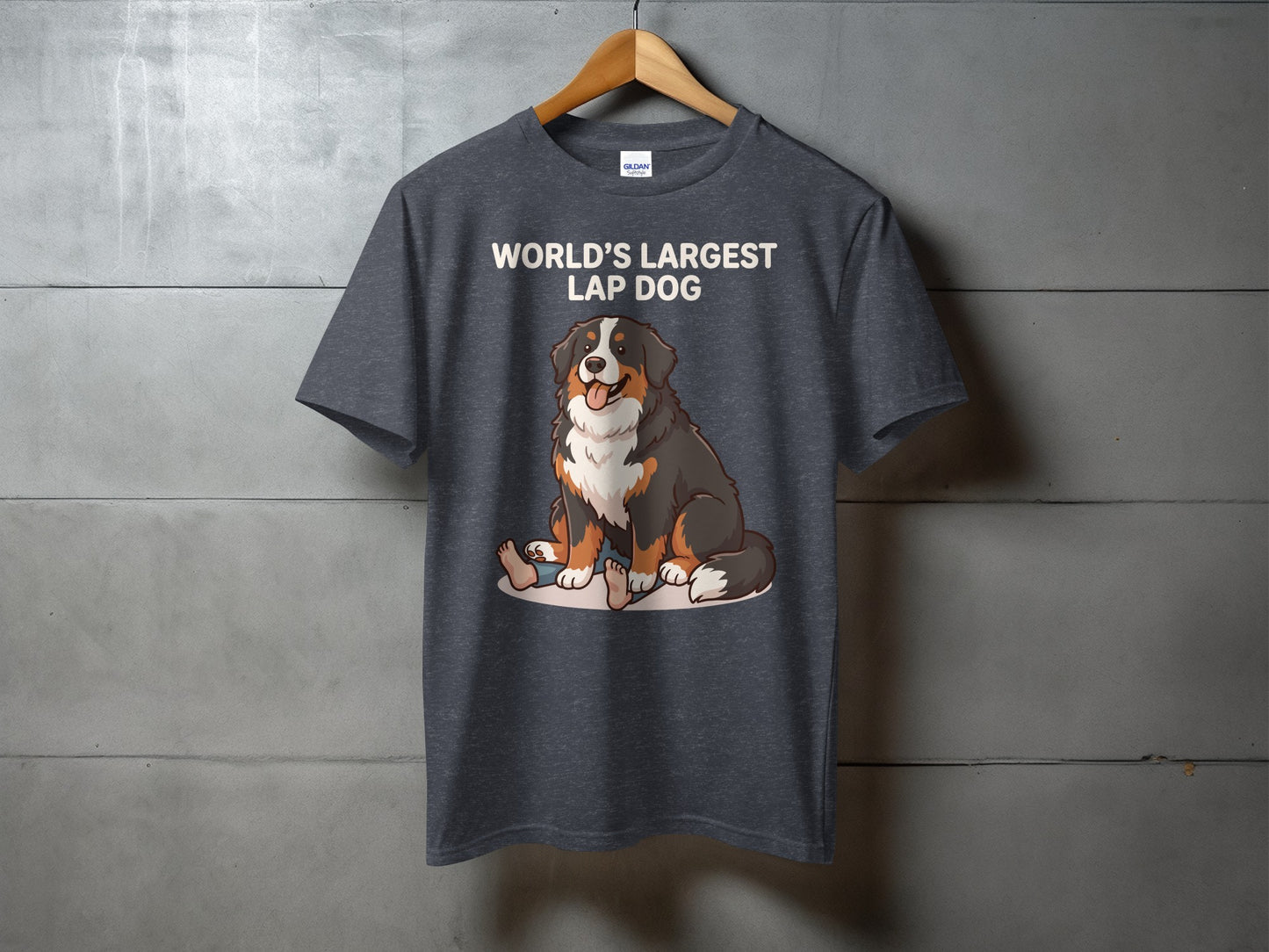 Dark grey t-shirt featuring a cartoon Bernese Mountain Dog and text "WORLD'S LARGEST LAP DOG".