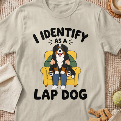 T-shirt graphic: "I IDENTIFY AS A LAP DOG" with a Bernese Mountain Dog sitting on a yellow couch.