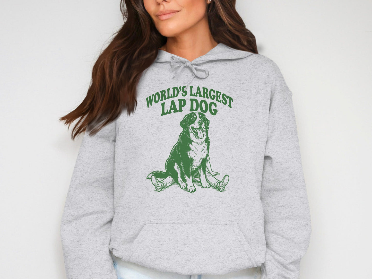 Light gray hoodie with green "WORLD'S LARGEST LAP DOG" text and a dog illustration.