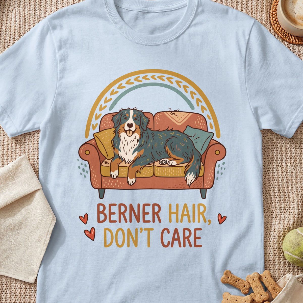 Berner dog on couch with text "BERNER HAIR, DON'T CARE"