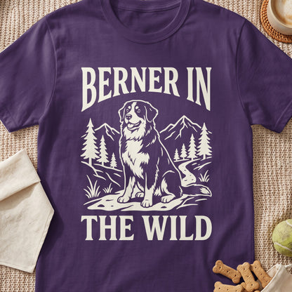 Purple t-shirt with cream text "BERNER IN THE WILD" and a Bernese Mountain Dog illustration.