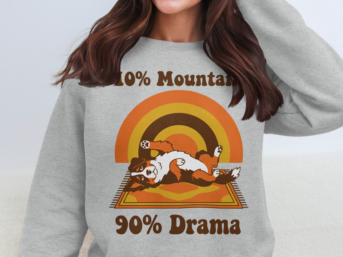 Grey sweatshirt with brown text "10% Mountain 90% Drama" and a dog graphic.