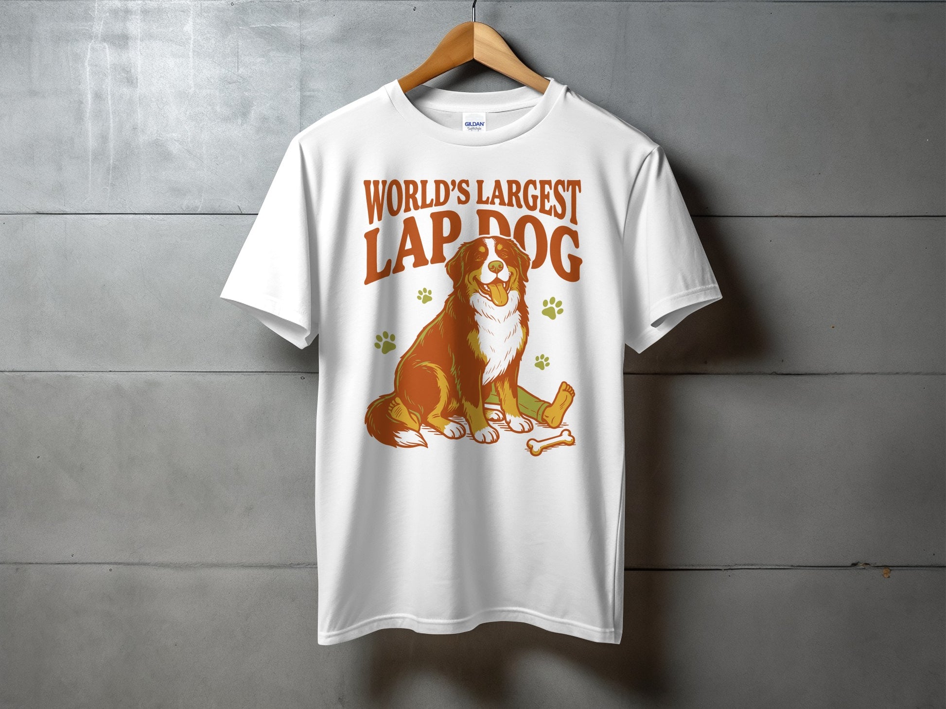 White t-shirt with "World's Largest Lap Dog" text and a Bernese Mountain Dog illustration.