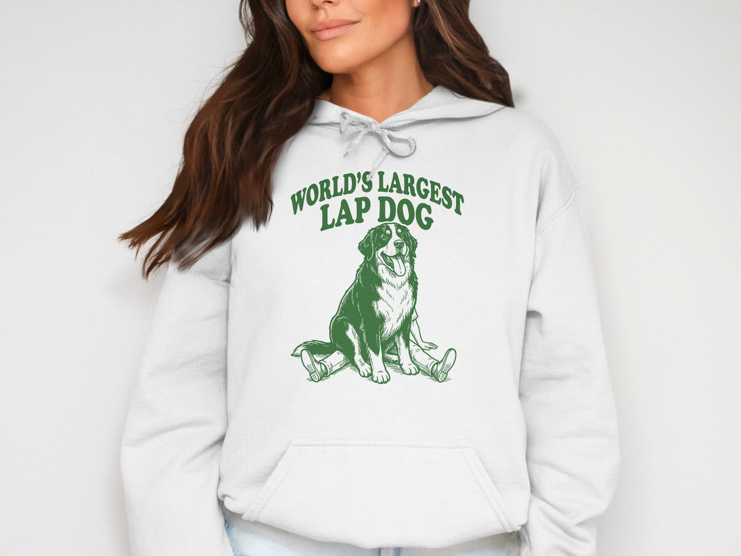 White hoodie with green text "WORLD'S LARGEST LAP DOG" and a dog illustration.