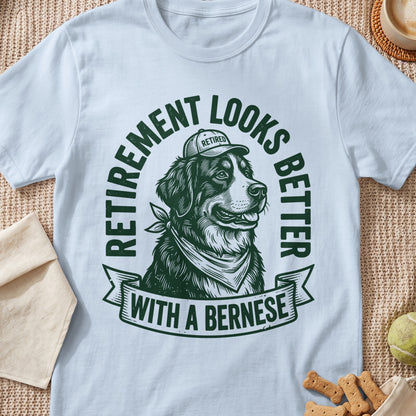 Bernese dog wearing a "Retired" cap and bandana, "Retirement Looks Better With A Bernese" text.