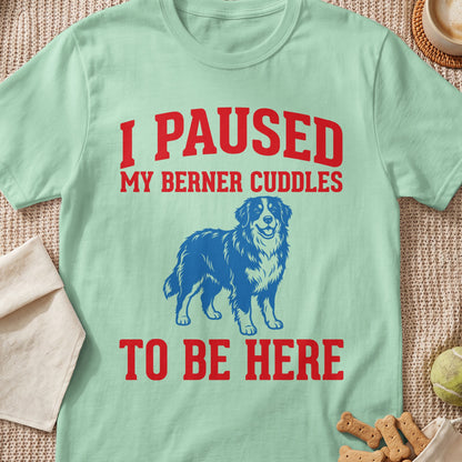 Light mint t-shirt with red text and a blue dog illustration.