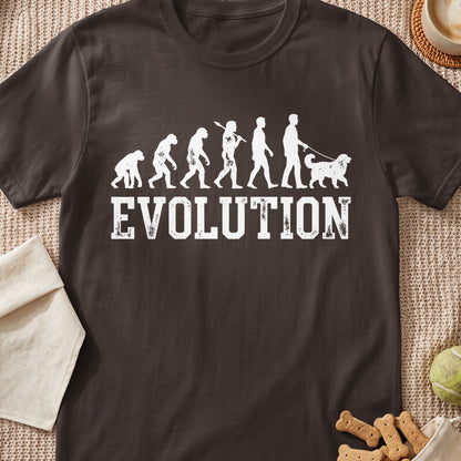 Brown t-shirt with white "EVOLUTION" text and a graphic of human evolution ending with a person walking a dog.