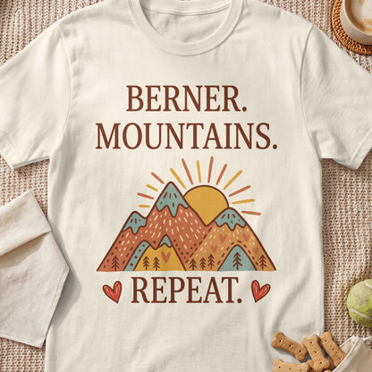 Cream t-shirt with "BERNER. MOUNTAINS. REPEAT." text and mountain illustration.