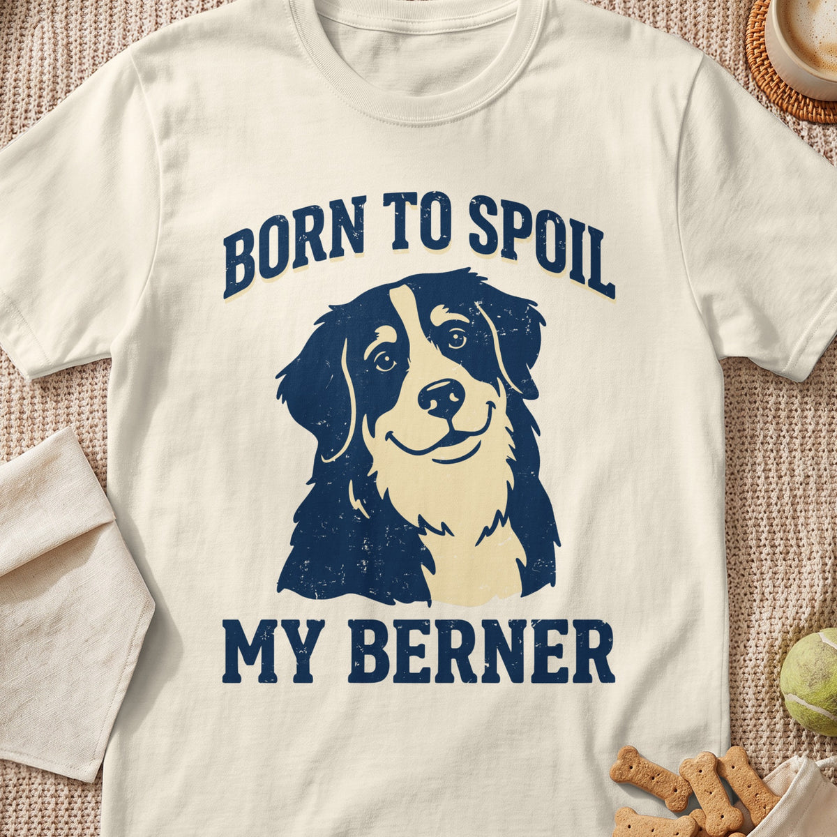 Cream t-shirt with dark blue distressed text and illustration of a Bernese Mountain Dog.