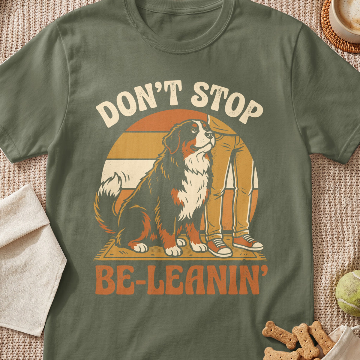 Bernese Mountain Dog with text "DON'T STOP BE-LEANIN'" on a t-shirt.