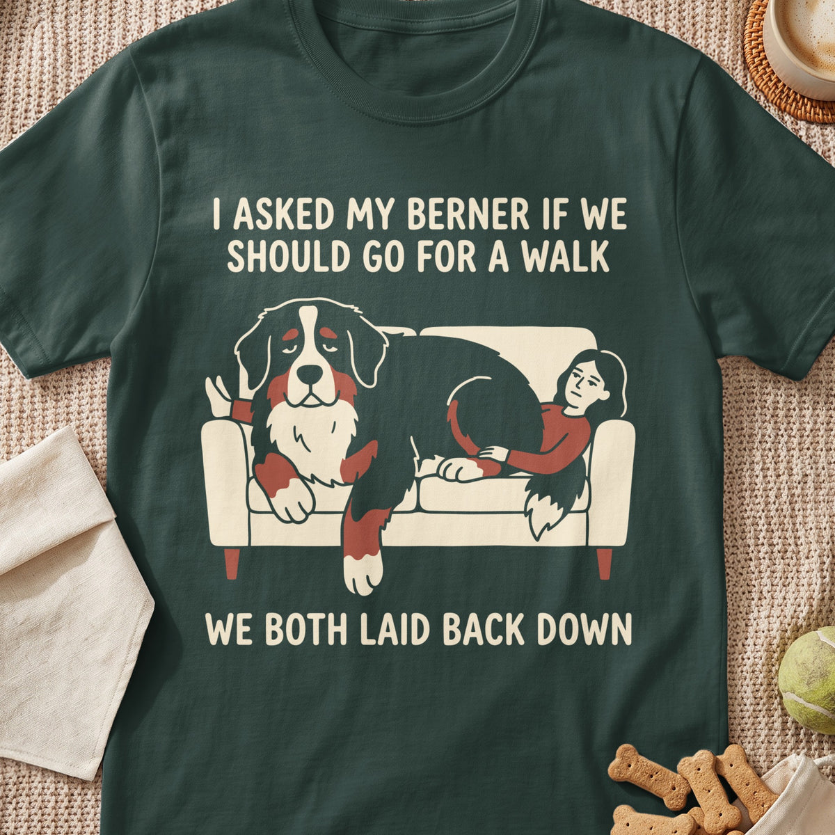 T-shirt with Bernese Mountain Dog and person on couch graphic and text.