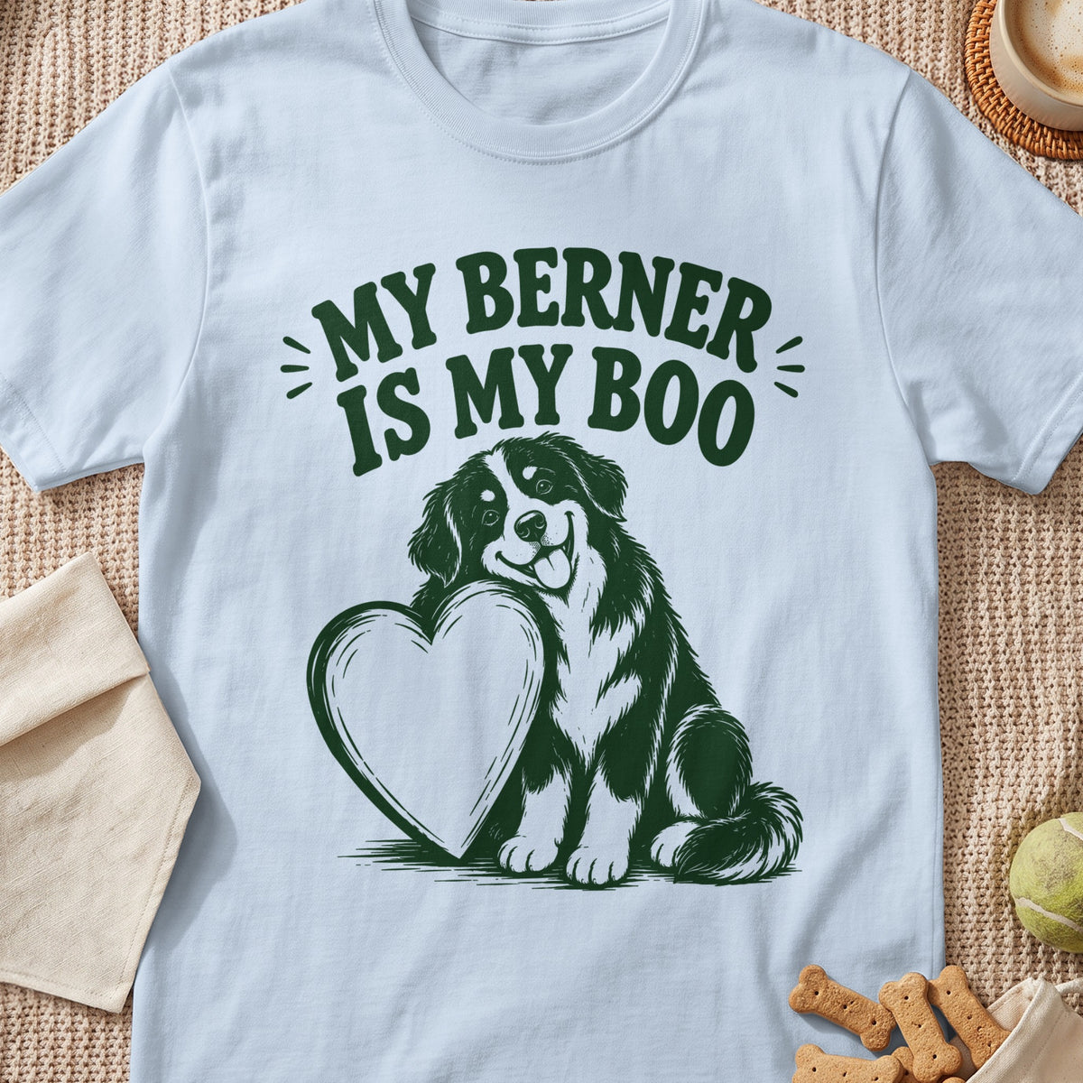 White t-shirt with green graphic: "MY BERNER IS MY BOO" and a Bernese Mountain Dog hugging a heart.