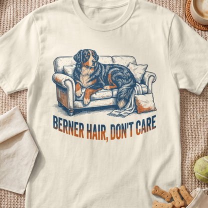 Bernese Mountain Dog on couch with text "BERNER HAIR, DON'T CARE".
