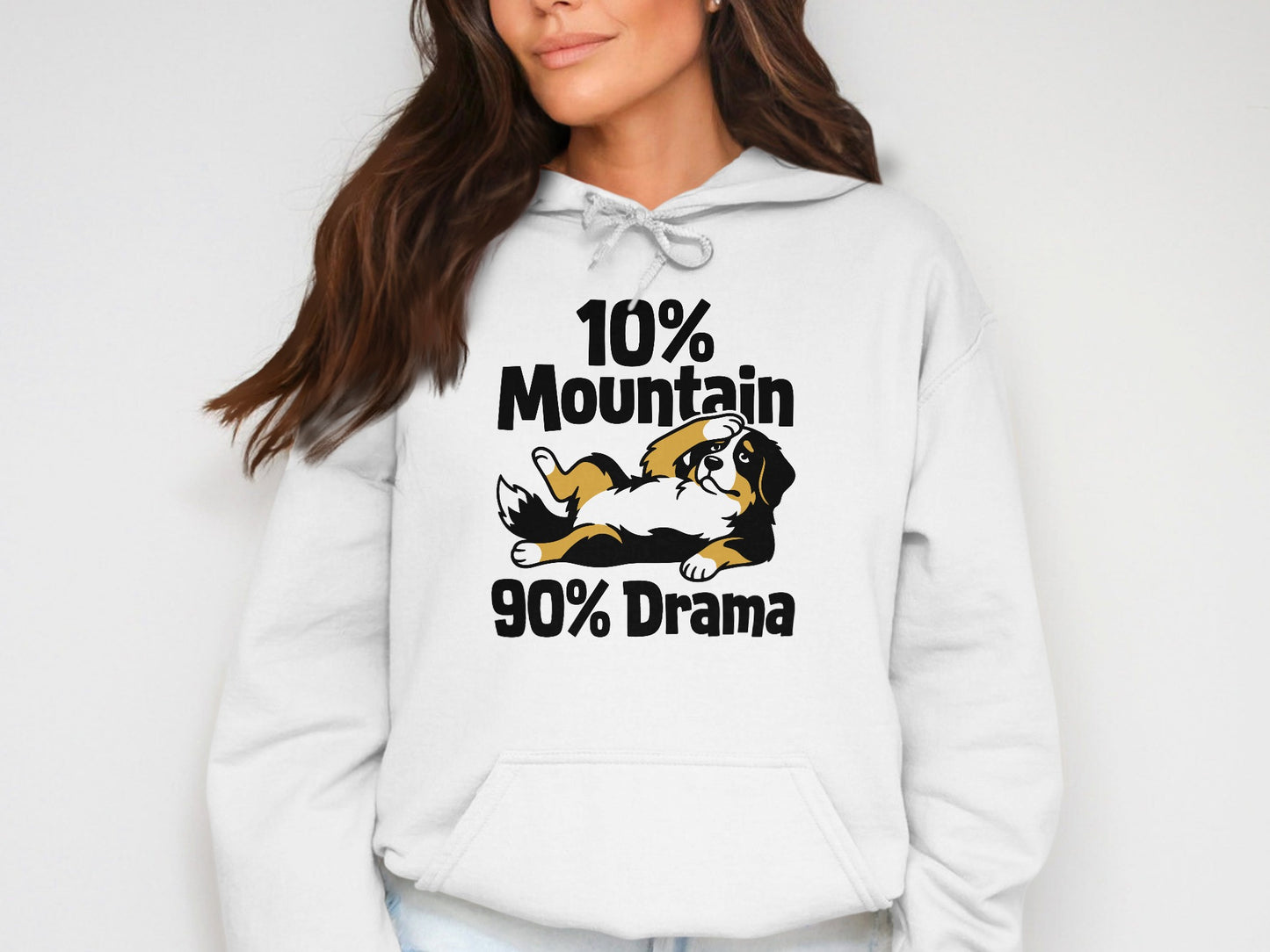 White hoodie with graphic text "10% Mountain 90% Drama" and a Bernese Mountain Dog.