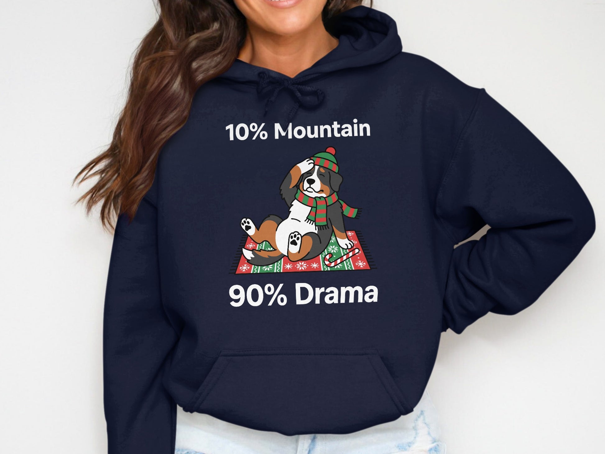 Bernese mountain dog wearing hat and scarf with "10% Mountain 90% Drama" text.