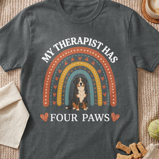 Bernese Mountain Dog sitting under a rainbow, text reads "MY THERAPIST HAS FOUR PAWS".