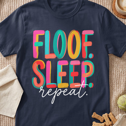 Navy t-shirt with "Floof. Sleep. repeat." in colorful, brushed lettering.