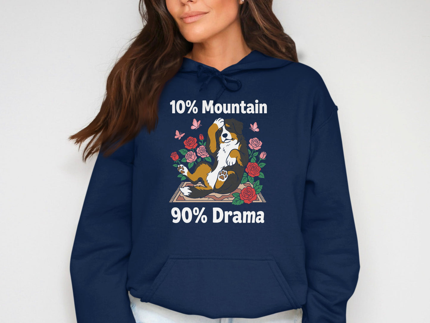 Bernese Mountain Dog with roses and butterflies, reading "10% Mountain 90% Drama".