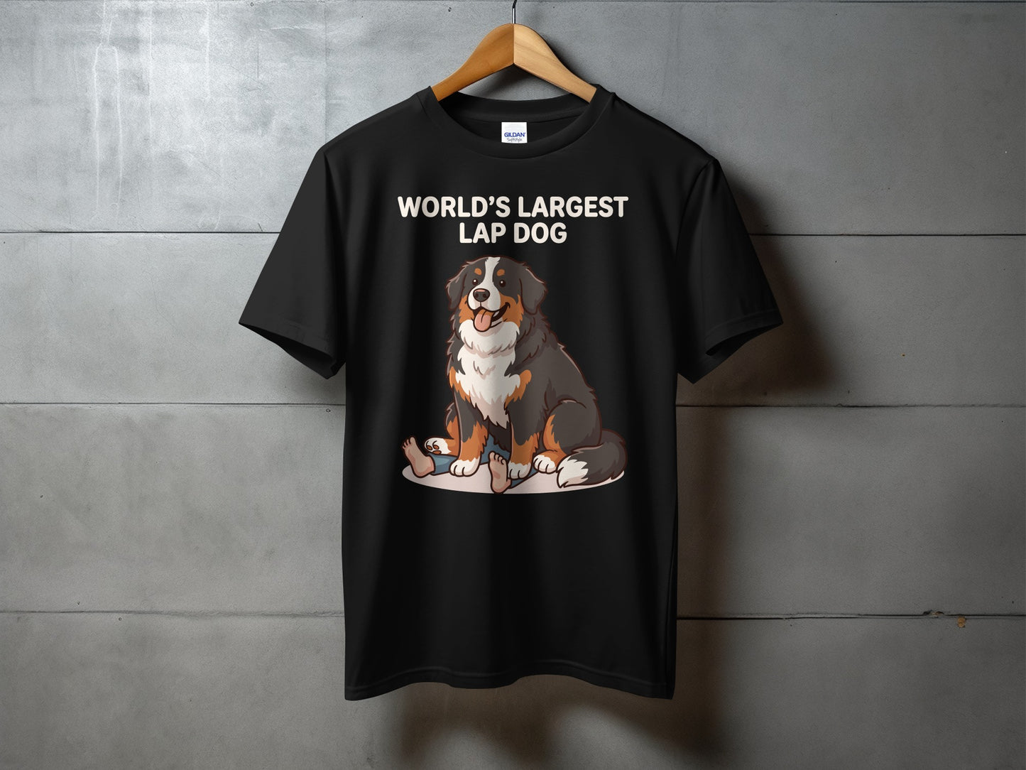 Black t-shirt with "WORLD'S LARGEST LAP DOG" text and cartoon Bernese Mountain dog sitting.