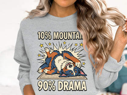 Grey sweatshirt with a cartoon dog and text "10% MOUNTAIN 90% DRAMA".