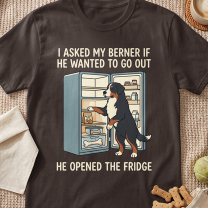 Bernese Mountain Dog opening a fridge with dog treats, with text "I asked my Berner if he wanted to go out".