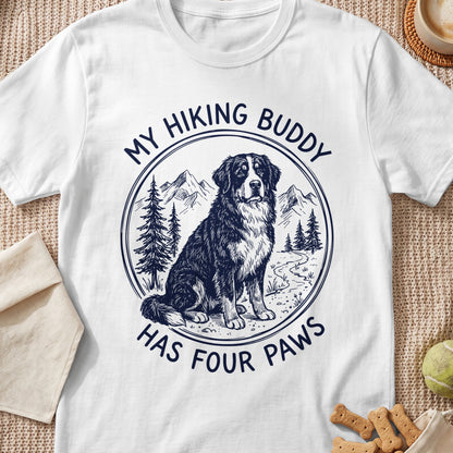 T-shirt with a sketch of a Bernese Mountain Dog and mountains, reads "My Hiking Buddy Has Four Paws".