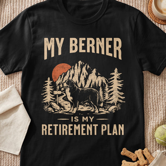 Black t-shirt with "My Berner Is My Retirement Plan" text and dog in mountains graphic.